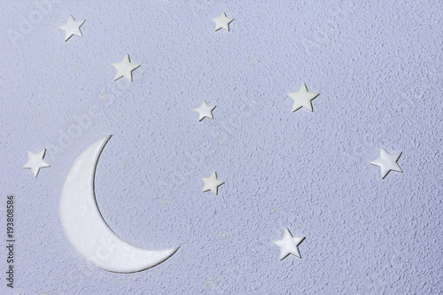 moon with stars on violet rugged background