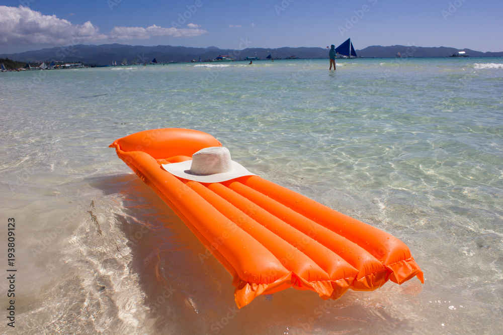 mattress for swimming, a hat, the sea, Borakay, Philippines mattress for swimming, a hat, the sea, Borakay, Philippines