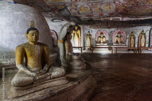 DAMBULLA, SRI LANKA - JULY 20, 2016: Buddha statues in a cave of Dambulla cave temple, Sri Lanka