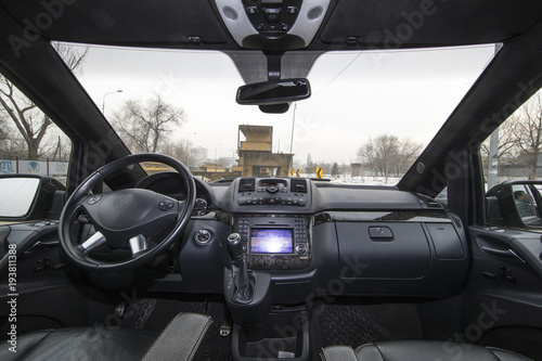 Dashboard of a recent car with steering wheel