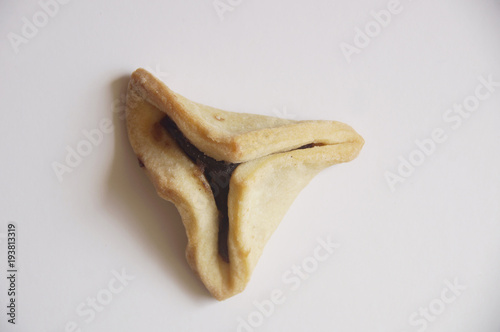 traditional purim triangular pastry stuffed with figs