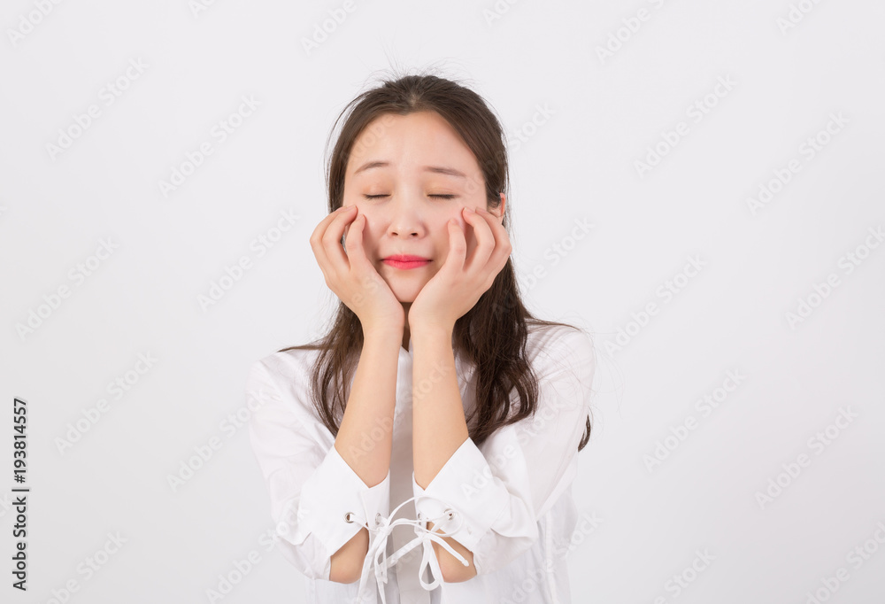 Sad young woman covering her face, crying for problem of expression. Negative feelings concept. Sad young woman covering her face, crying for problem of expression. Negative feelings concept.