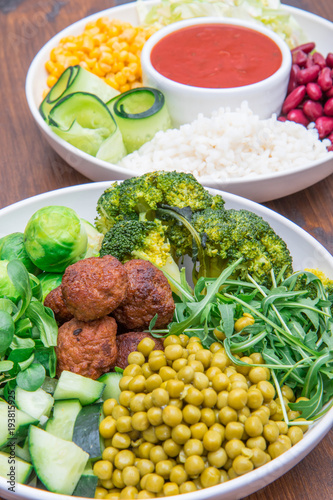 vegan dish with rice, vegetables and soy meatballs