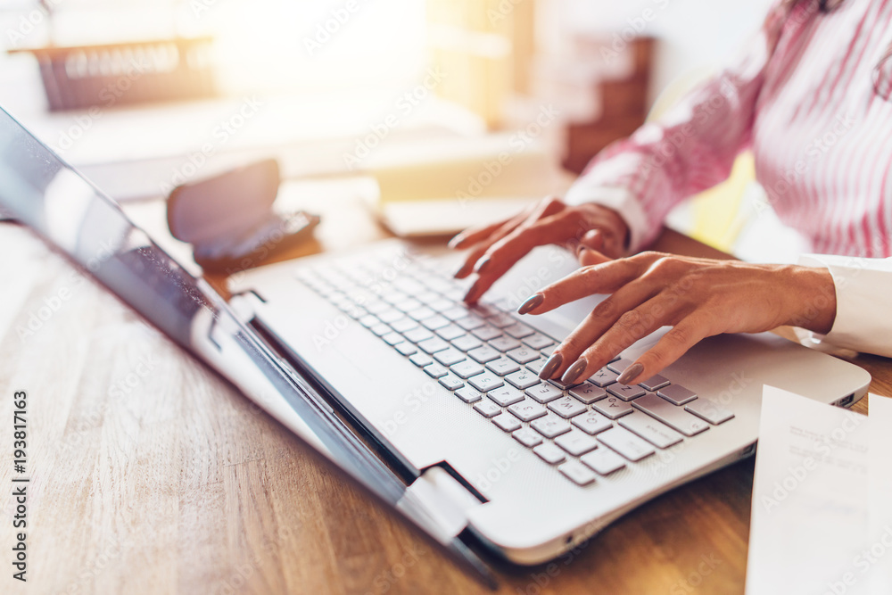Women hands typing on the keyboard Work at home. Women hands typing on the keyboard Work at home.