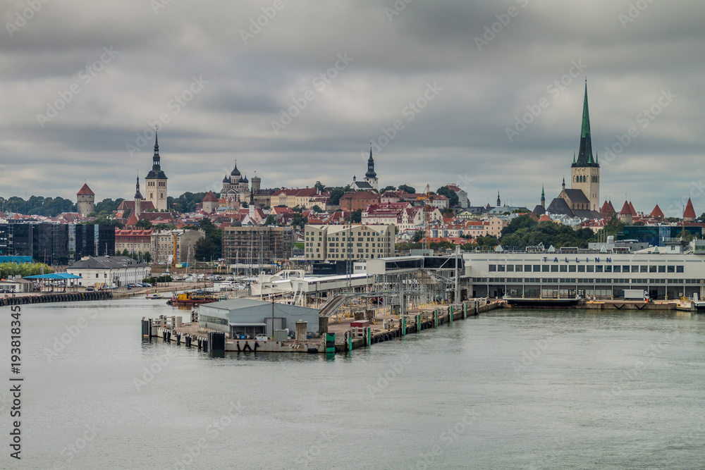 Naklejka premium Ferry harbor and a skyline of Tallinn, Estonia