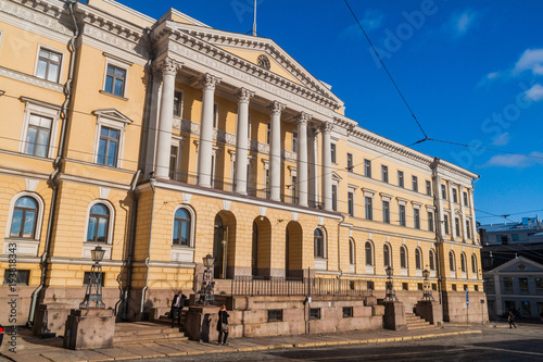 HELSINKI, FINLAND - AUGUST 24, 2016: Yellow colored columned Government Palace on the Senate Square in Helsinki photo
