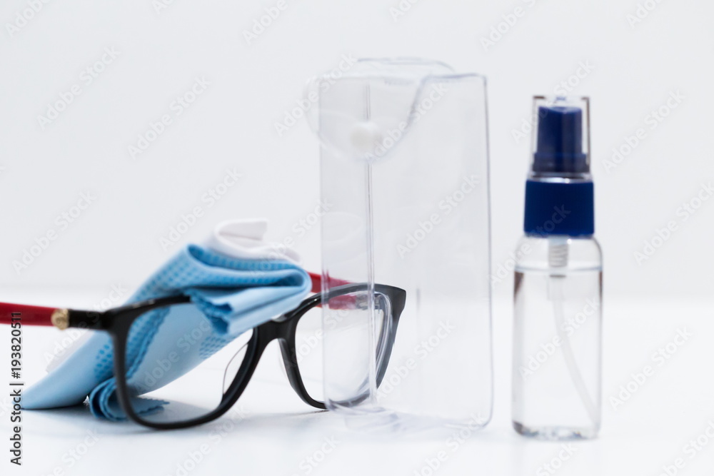 Glasses, napkins, liquid in a bottle, white background Glasses, napkins, liquid in a bottle, white background