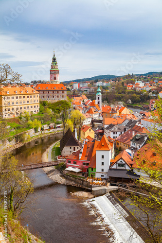 Aerial view of the mill and old town of Cesky Krumlov along the river, Czech republic. Bright spring time.