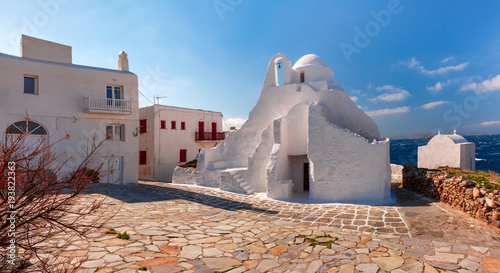 Panorama of Church of Panagia Paraportiani, the most famous architectural structures in Greece, on the island Mykonos, The island of the winds, Greece photo