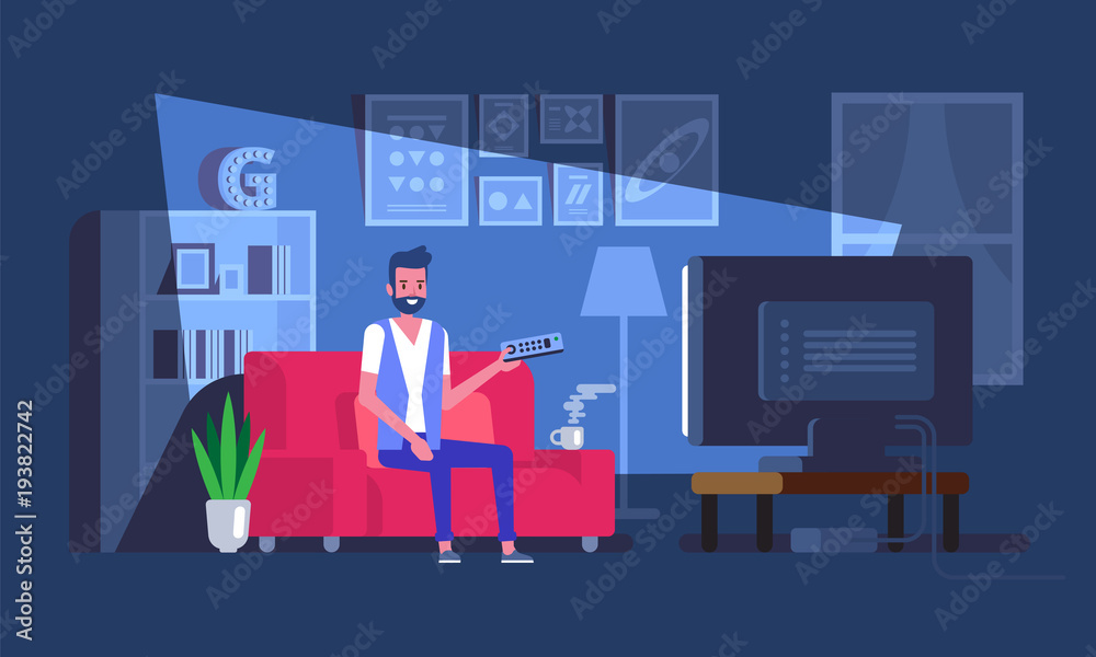 Man sitting on sofa and watching tv Man sitting on sofa and watching tv