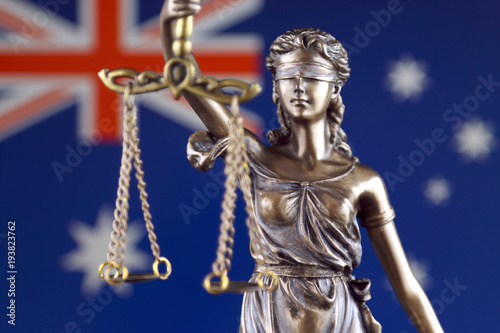 Symbol of law and justice with Australia Flag. Close up.