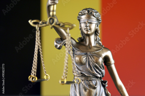 Symbol of law and justice with Belgium Flag. Close up.