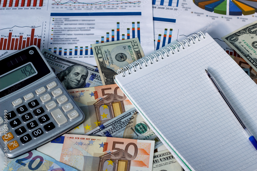 Financial calculations, money and hexagrams on the table