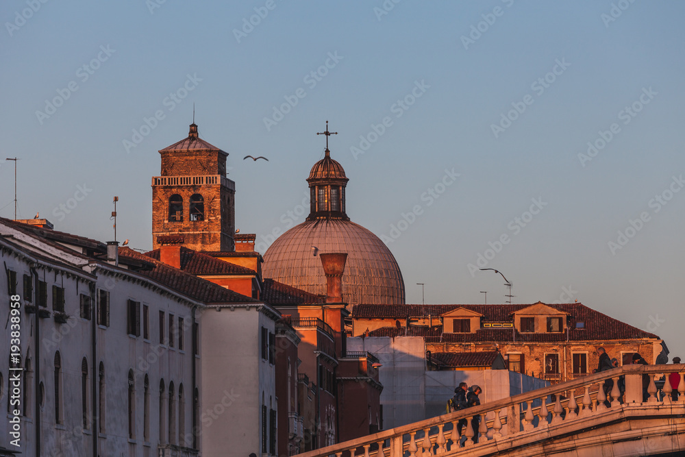 VENICE, ITALY - FEBRUARY 14 2018: View of the dome of the church of San Geremia at sunset