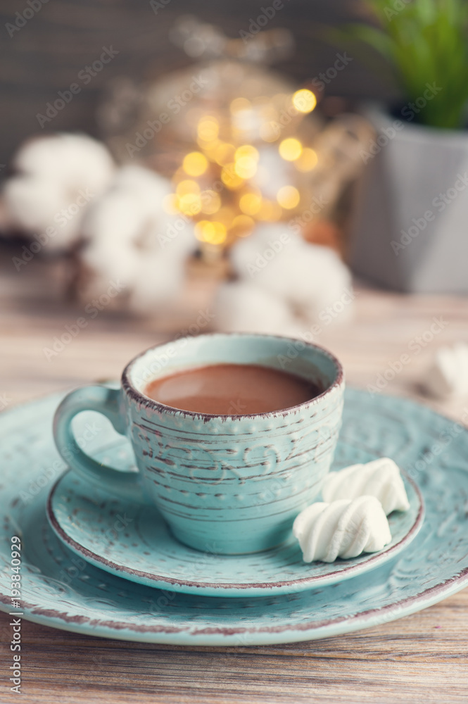 Cup of hot chocolate and lights Cup of hot chocolate and lights