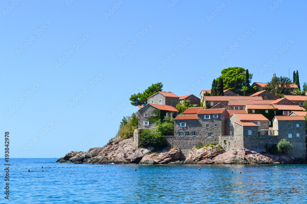 Saint Stephen's Island, Montenegro 14 september 2017: Sveti Stefan (St. Stefan) island in Adriatic sea, Montenegro - obrazy, fototapety, plakaty 