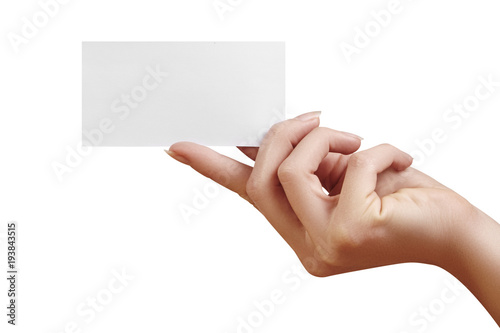 Beautiful female Hand holding paper business card on white background. Gift card, cutaway, graphic design