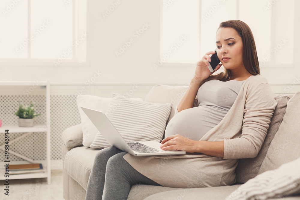 Pregnant business woman remote working at home Pregnant business woman remote working at home