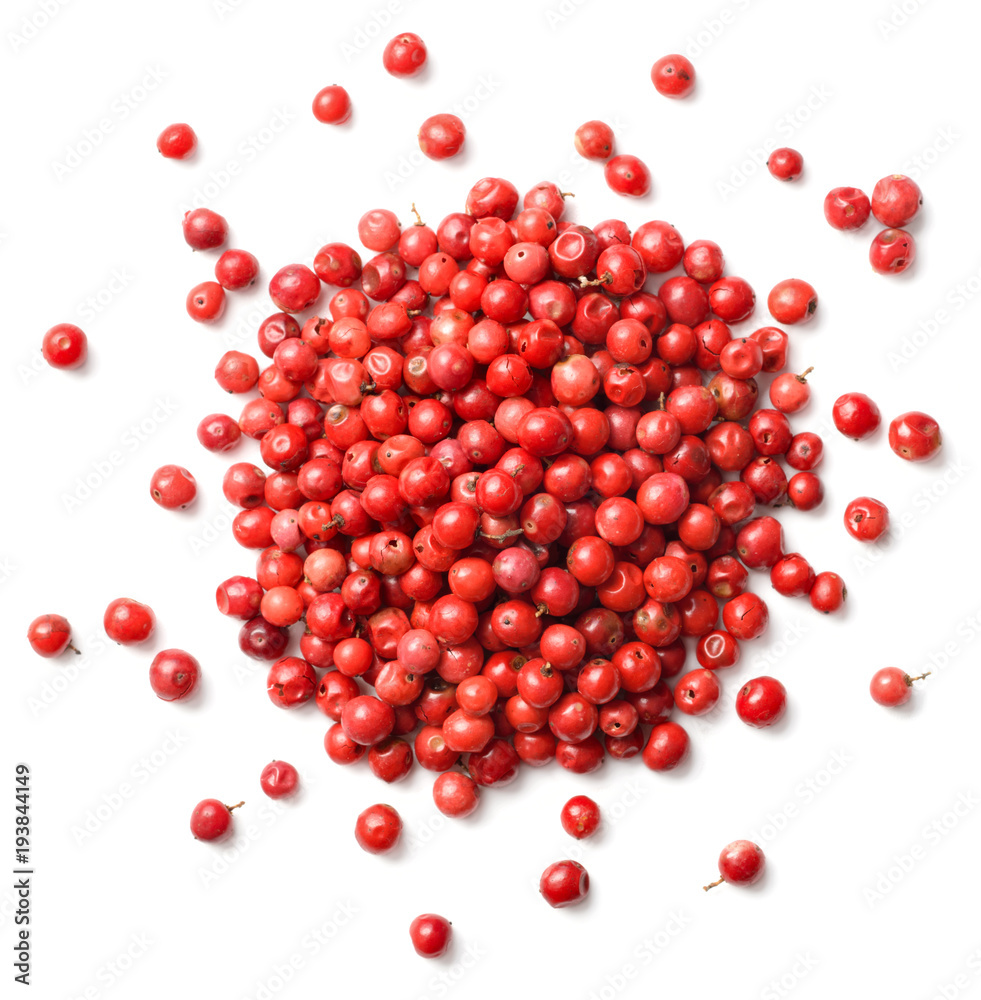 dried pink peppers isolated on white dried pink peppers isolated on white