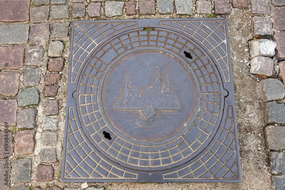 Manhole in the center of old Riga