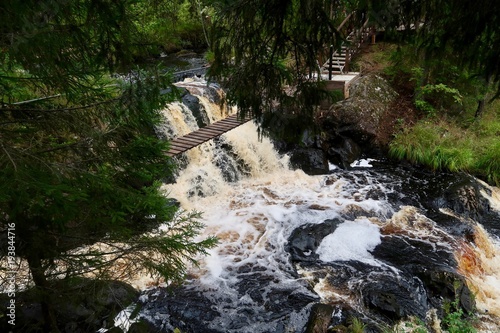 Bridge over the waterfall in Karelia