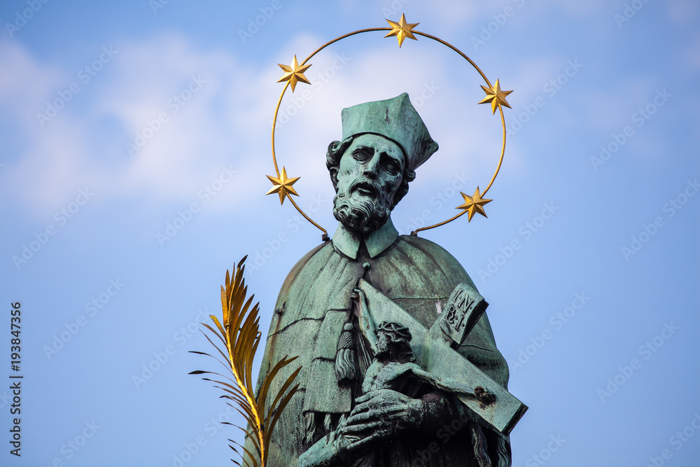 Sculpture of John of Nepomuk on the Charles bridge in Prague Sculpture of John of Nepomuk on the Charles bridge in Prague