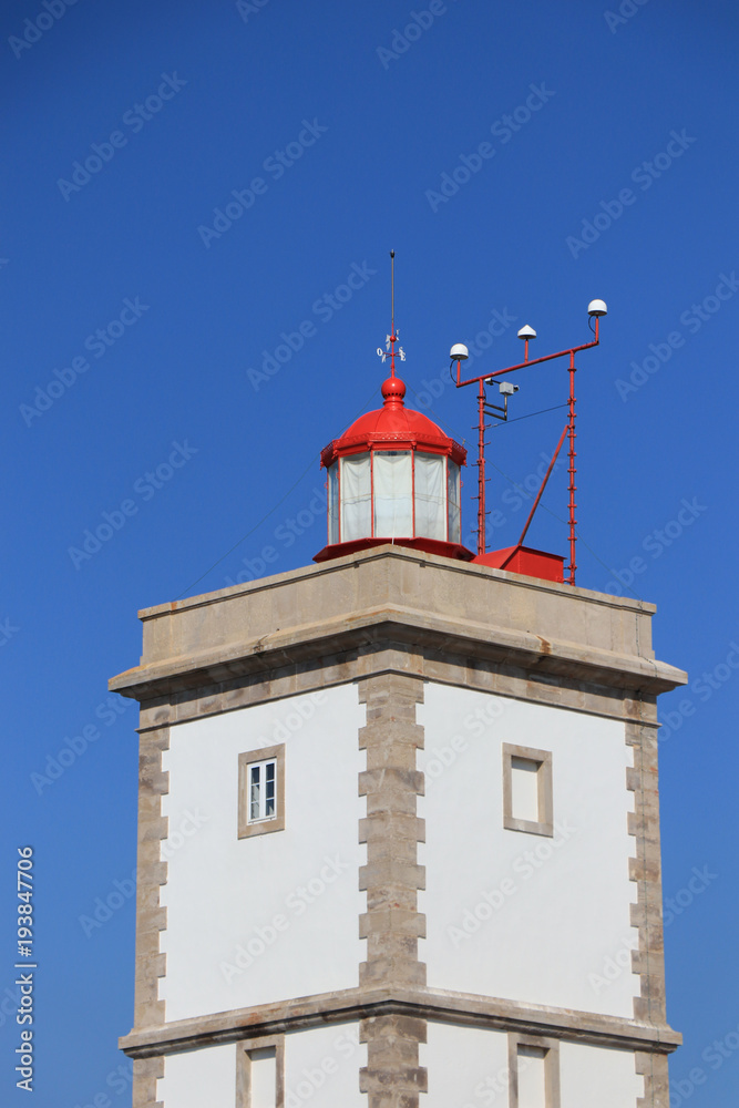 Lighthouse with a blue sky in background. Peniche Portugal Lighthouse with a blue sky in background. Peniche Portugal