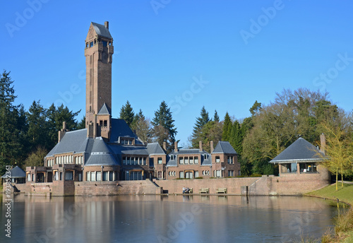 Jachtslot Sint-Hubertus is a building in De Hoge Veluwe National Park, between Otterlo and Hoenderloo. It was designed in 1914 by architect Berlage, commissioned by the Kroller-Muller couple. photo