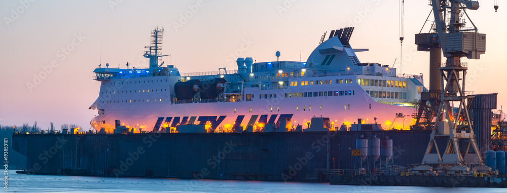 Obraz premium Szczecin,Poland-February 2017:Passenger ferry in the dry dock of the repair yard. Repair yard in Szczecin, Poland