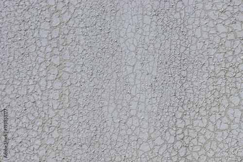 gray cracked paint on a metal surface, background, texture