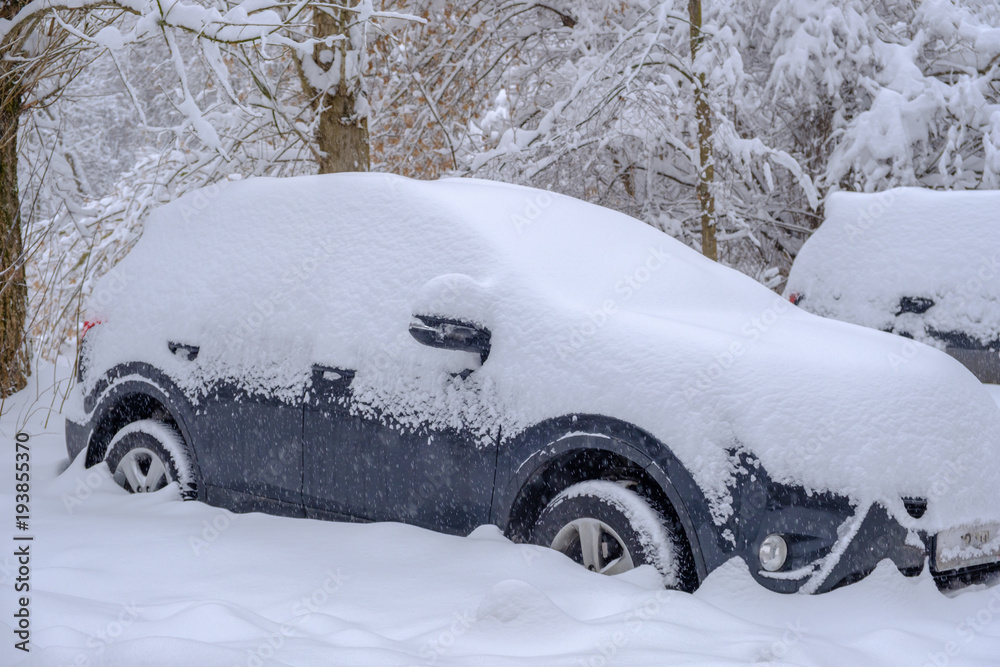 Parked cars, under snow after strongest snowfall. Parked cars, under snow after strongest snowfall.