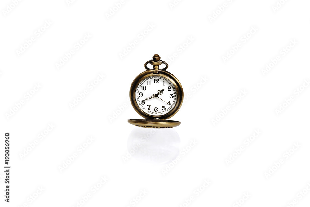 A vintage pocket watch on a white background close-up. There is a way.