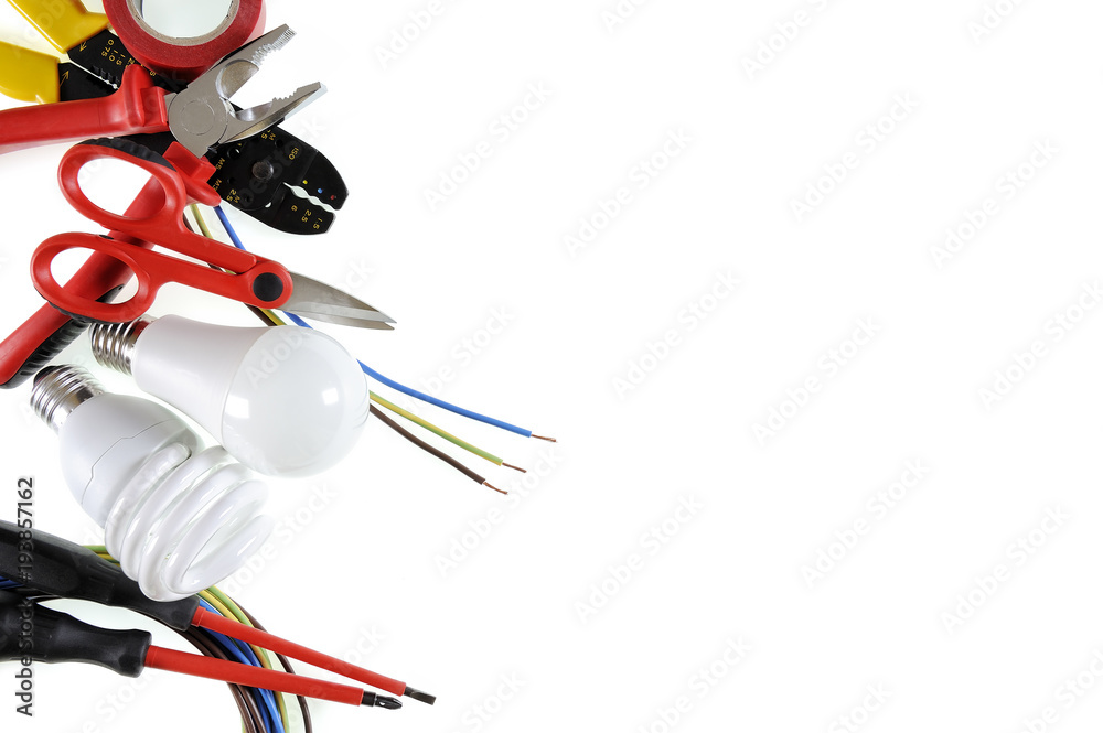 Top view of working tools and components of the electrical system on white background. Top view of working tools and components of the electrical system on white background.