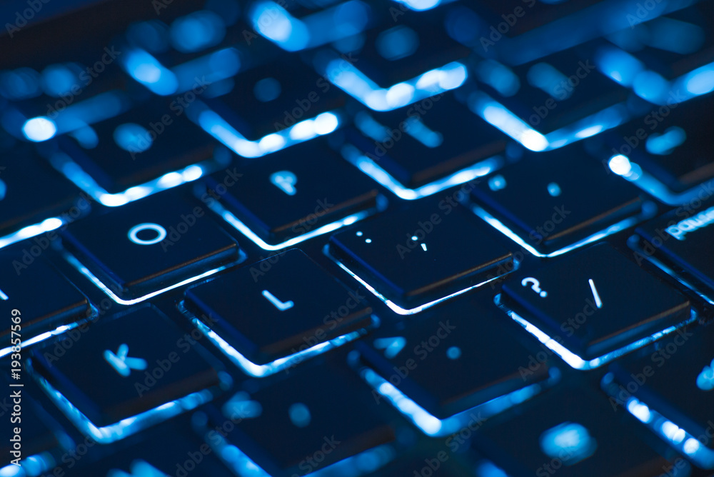 Illuminated keyboard closeup. Hi tech concept Illuminated keyboard closeup. Hi tech concept