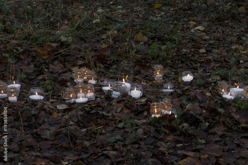 The candles are on the ground The candles are on the ground