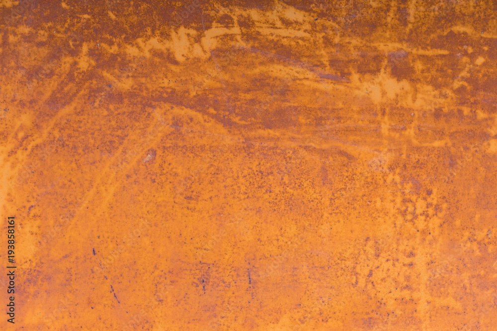 Textured background of a faded yellow paint with rusted cracks on rusted metal. Grunge texture of an old cracked metal surface. Rusty yellow-red stains Textured background of a faded yellow paint with rusted cracks on rusted metal. Grunge texture of an old cracked metal surface. Rusty yellow-red stains