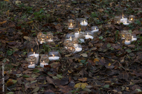 The candles are on the ground