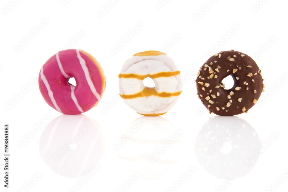 Donuts in pink, white and chocolate