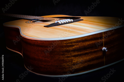 wooden acoustic guitar in vintage tone
