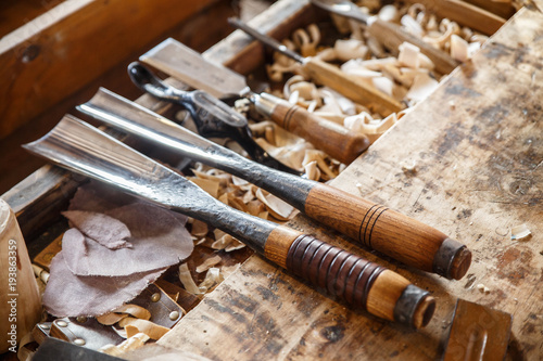 Old traditional carpenter's workshop with its wealth of tools and wood.