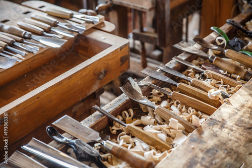 Tableau sur toile Old traditional carpenter's workshop with its wealth of tools and wood