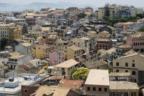 View on Corfu city or Kerkyra from New Fortress. Skyline of typical houses of old town. Tourist attraction and popular vacation destination. Sunny day in beginning of June.  arkhitiektura zodchiestvo  photo