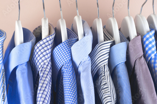 Cloth Hangers with Shirts. Men's clothes