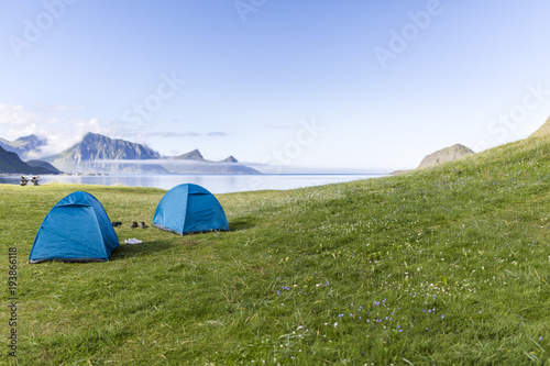 Two Blue Tents at the Beach.
