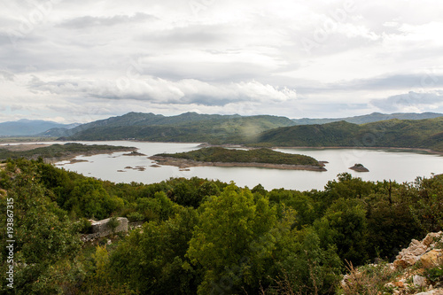 Obraz na płótnie view of a large lake with Islands in Montenegro in the mountains w salonie