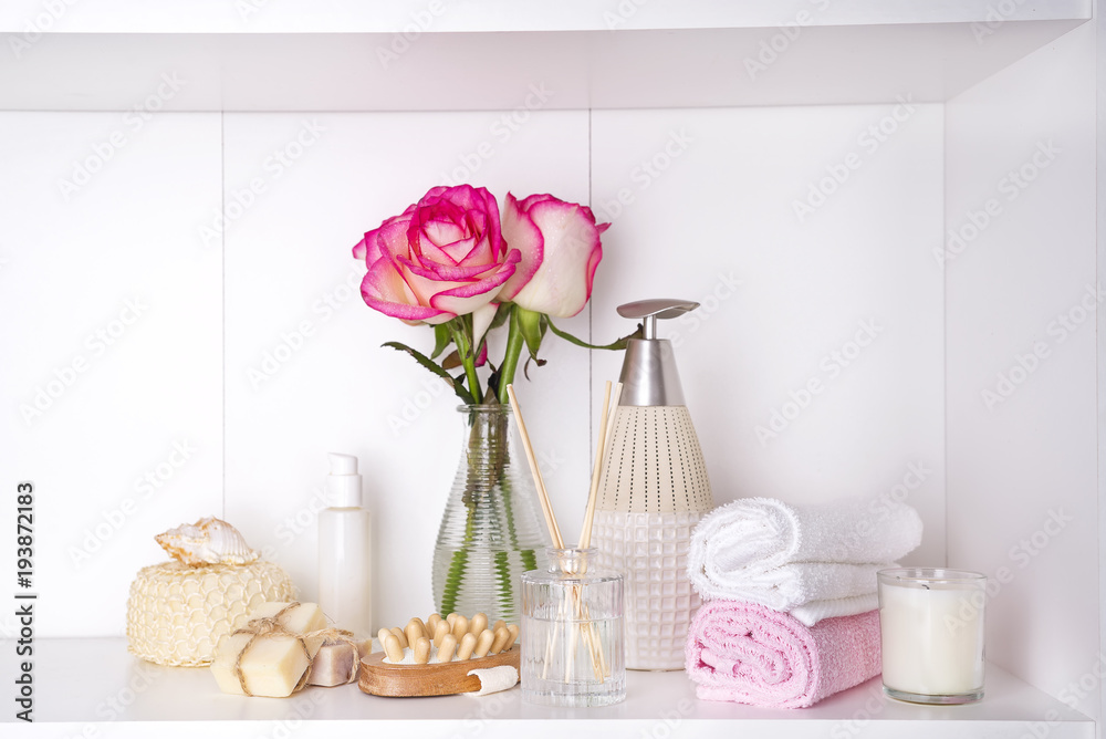 Spa bath cosmetic and flower rose, isolated on white