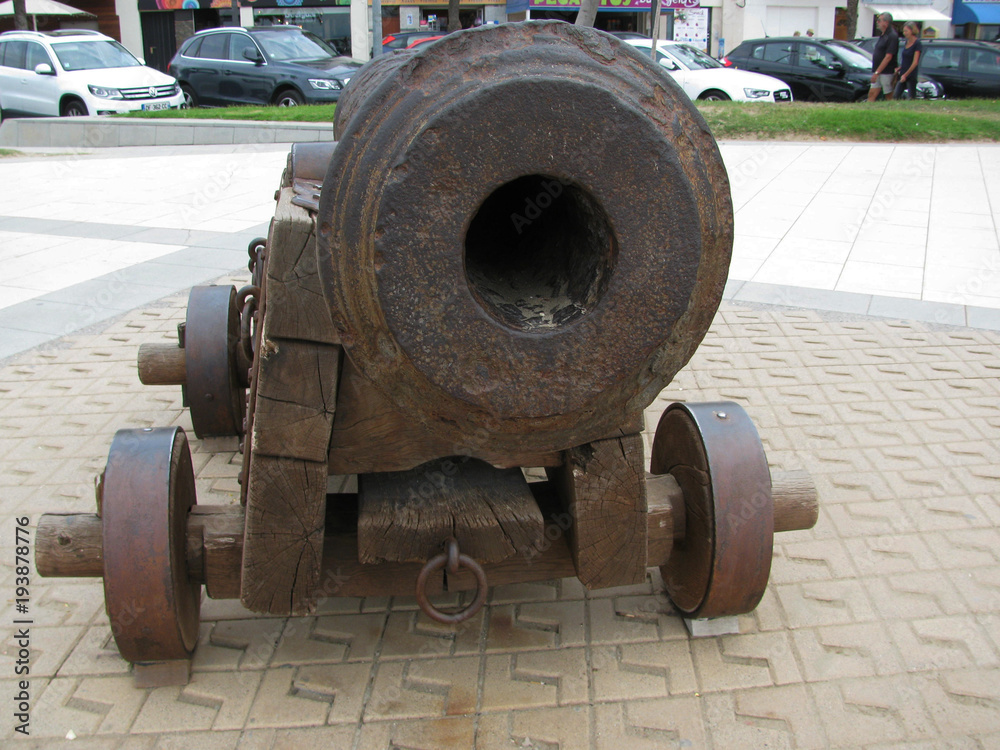 A small ancient cannon on the waterfront. A small ancient cannon on the waterfront.