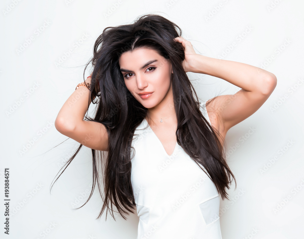 beautiful young woman with long black hair posing in white dress beautiful young woman with long black hair posing in white dress