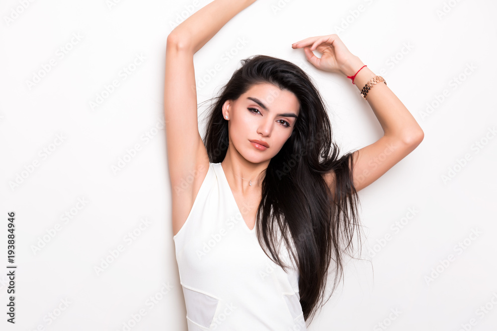 beautiful young woman with long black hair posing in white dress beautiful young woman with long black hair posing in white dress