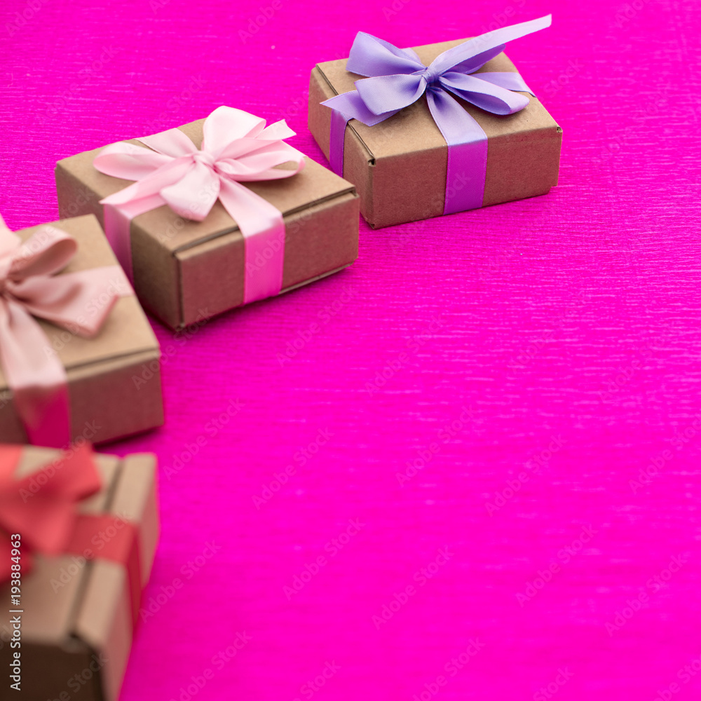 Gifts Packed in Kraft boxes tied with satin ribbon. Gifts Packed in Kraft boxes tied with satin ribbon.